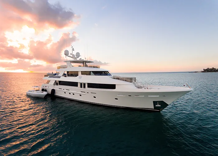 Wesport Yacht Westport Yacht in the ocean with sunset in background
